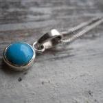 round turquoise pendant