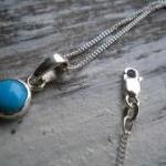 round turquoise pendant