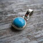 round turquoise pendant