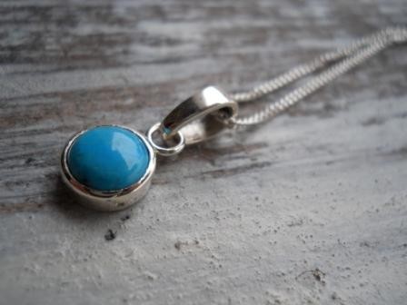 round turquoise pendant