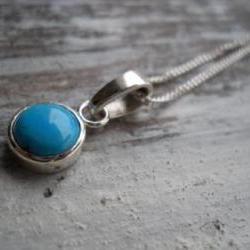 round turquoise pendant